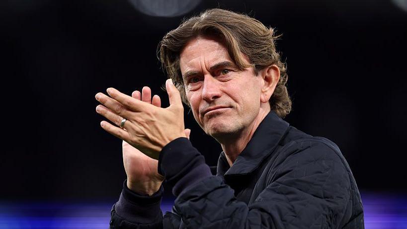 Tottenham’s Champions coach