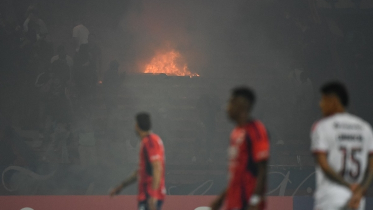 Holders Flamengo see Copa Libertadores match abandoned amid crowd trouble