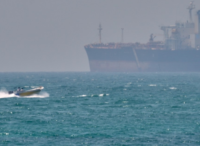Oil prices jump as US, Iran trade fire in Strait of Hormuz