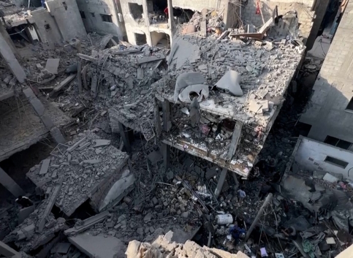 “Nowhere left to go”: Gaza residents return to rubble after Israeli strike