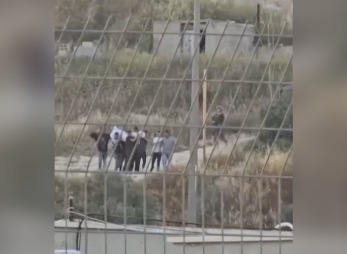 Palestinian family says settlers forced them to exhume father’s body