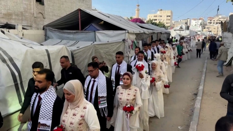 Mass wedding brings brief joy to couples in devastated Gaza