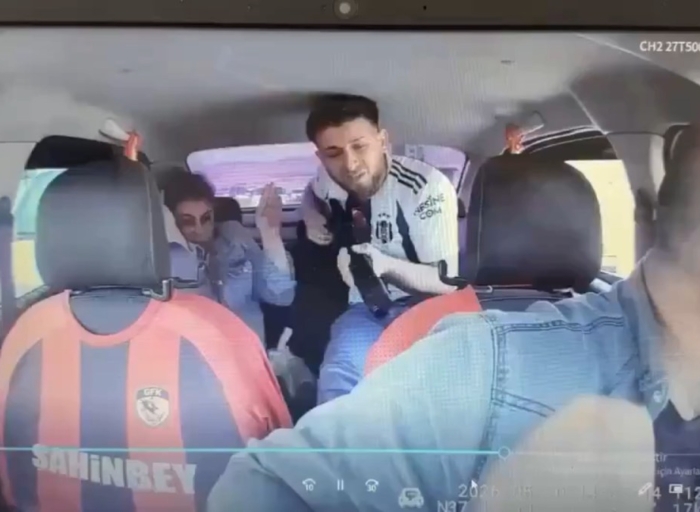 Moment taxi driver wrestles armed man during police chase in Turkiye