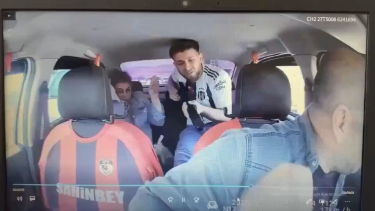 Moment taxi driver wrestles armed man during police chase in Turkiye