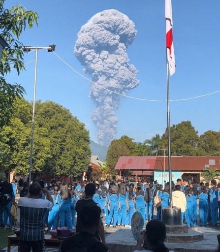 Indonesia volcano kills three as search for 20 missing hikers under way
